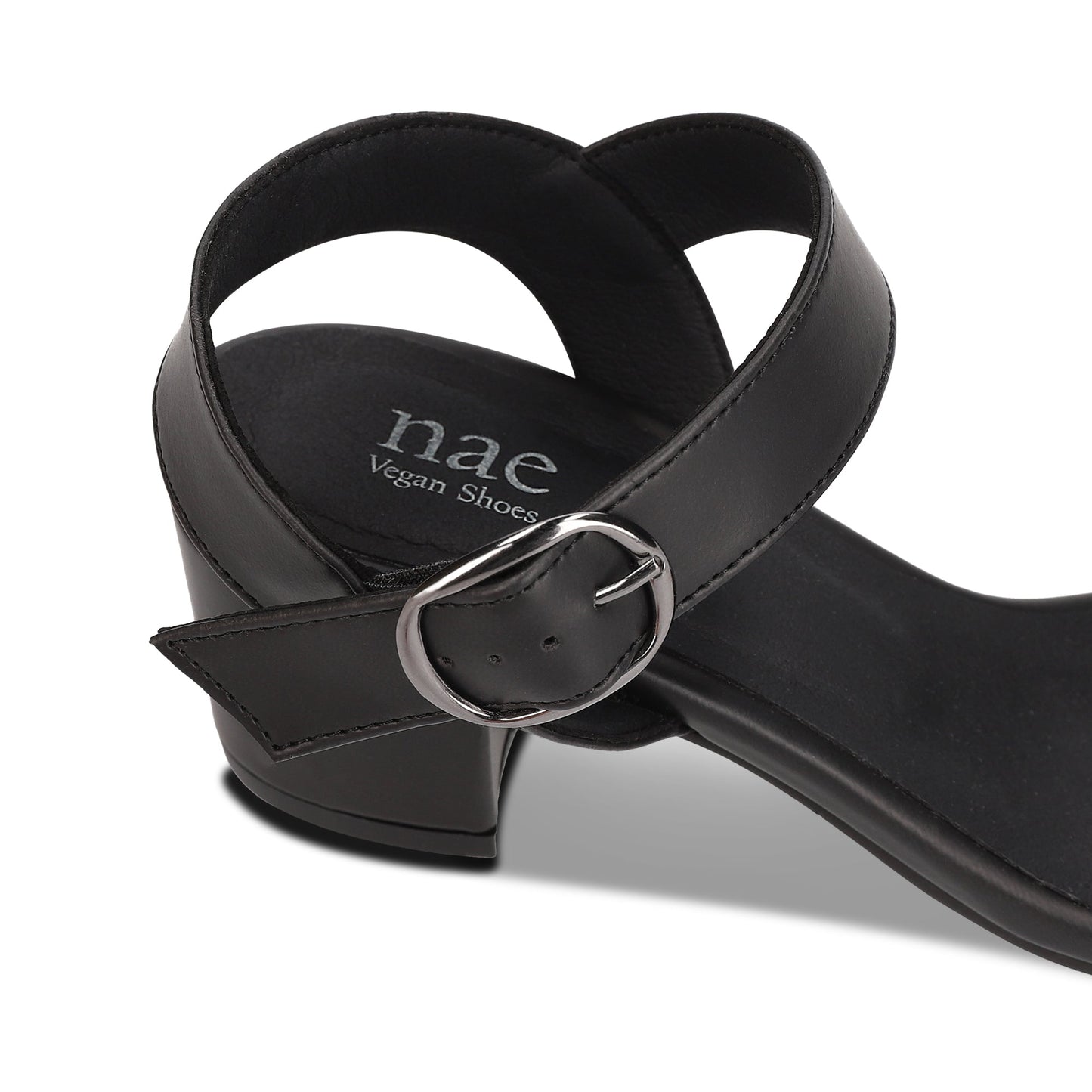 vegan heels with ankle strap buckle and NAE Vegan Shoes logo on the insole