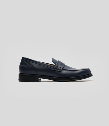 Vegan Loafer - Man, stylish navy shoe featuring blake construction and U-shaped stitched pattern.