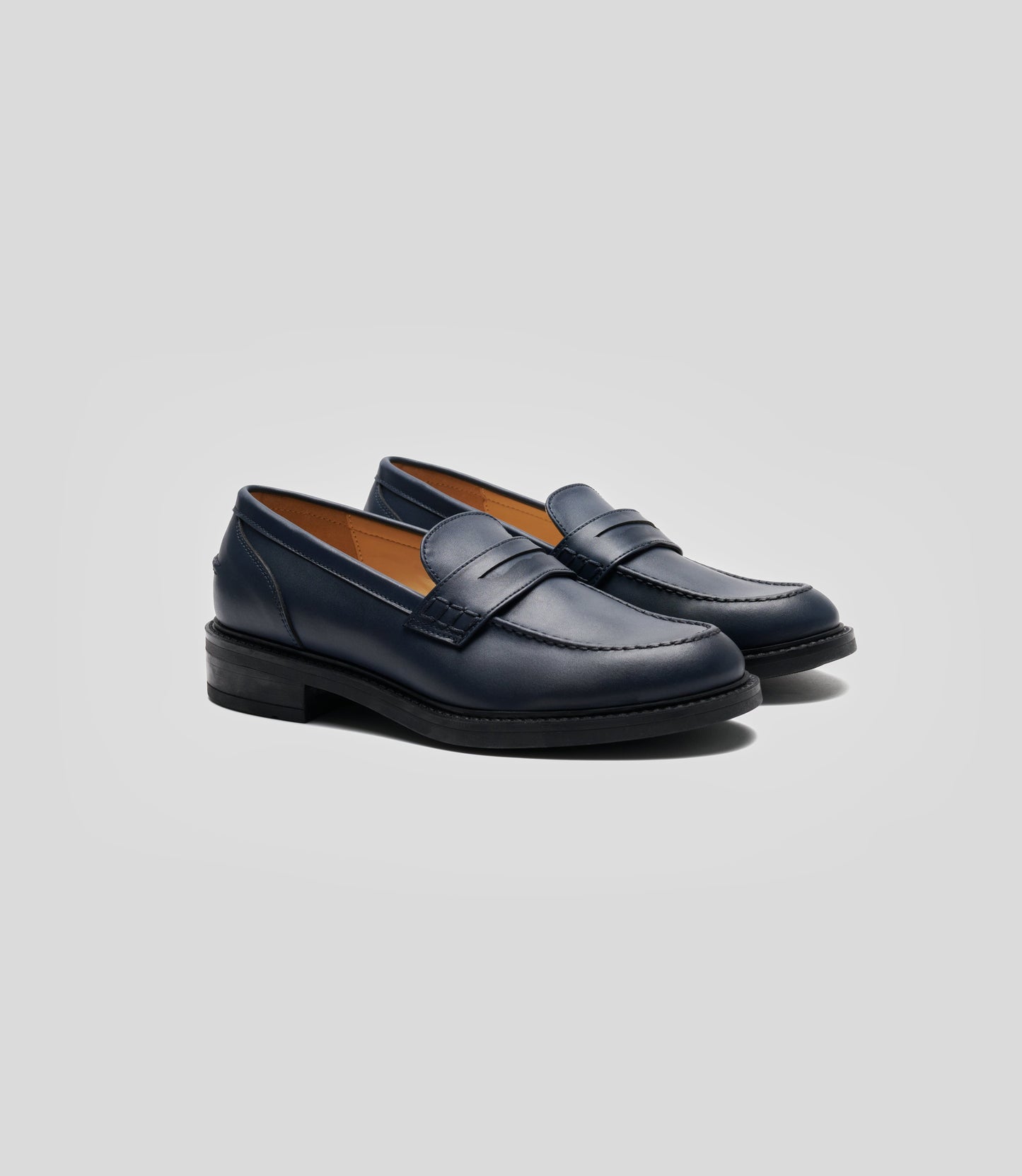 Vegan Loafer - Woman in navy blue with blake construction for casual and formal wear.