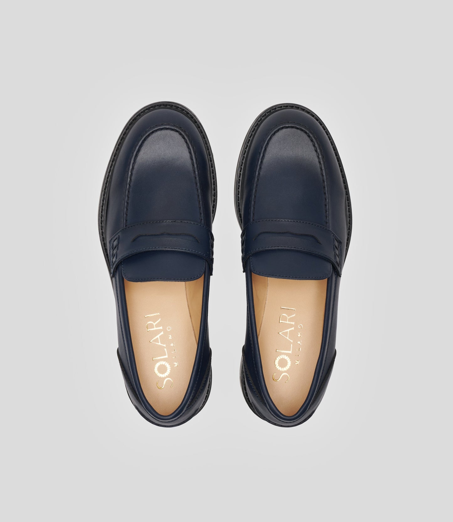 Vegan Loafer - Woman from Solari Milano with a sleek navy design and blake construction.