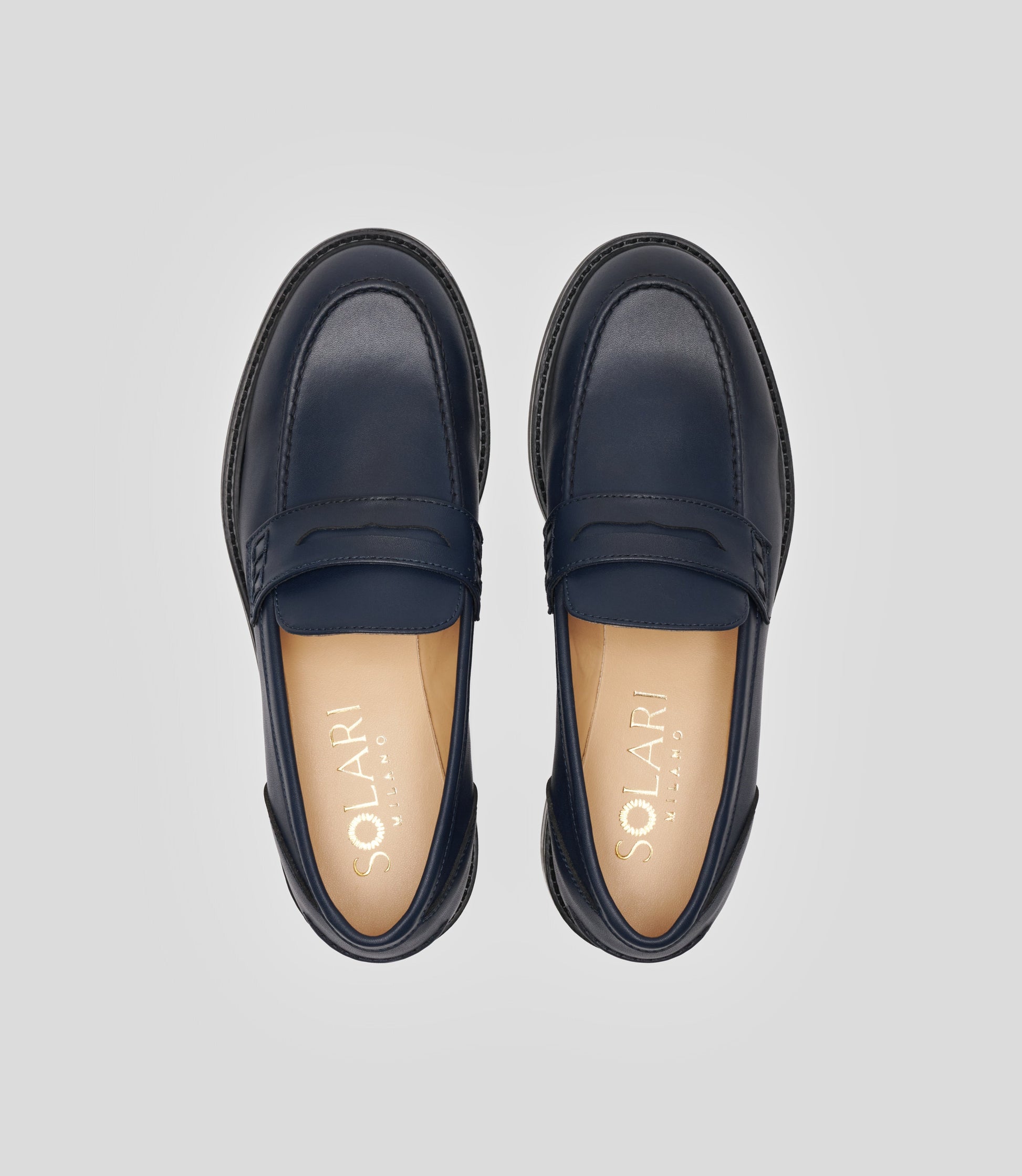 Vegan Loafer - Woman from Solari Milano with a sleek navy design and blake construction.