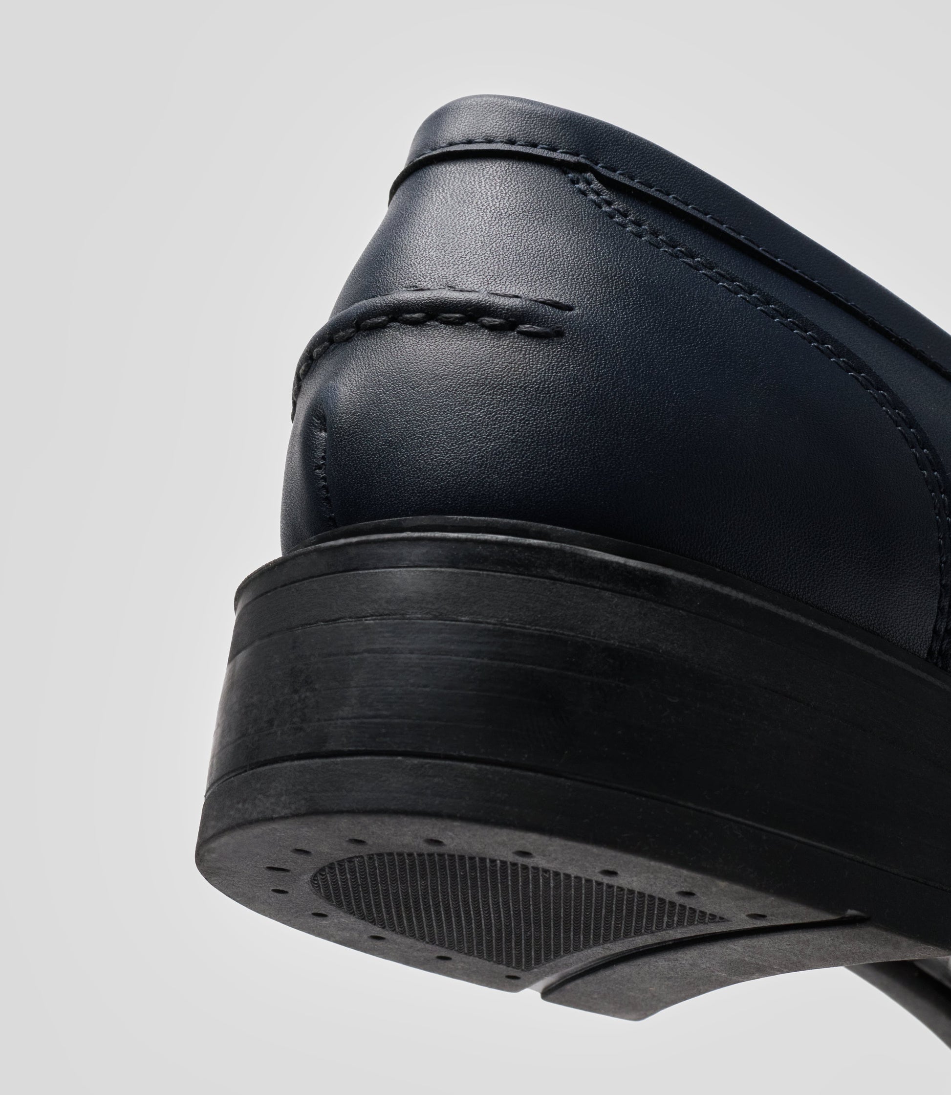 Close-up of the heel of Vegan Loafer - Woman showcasing the blake construction and distinctive stitching.